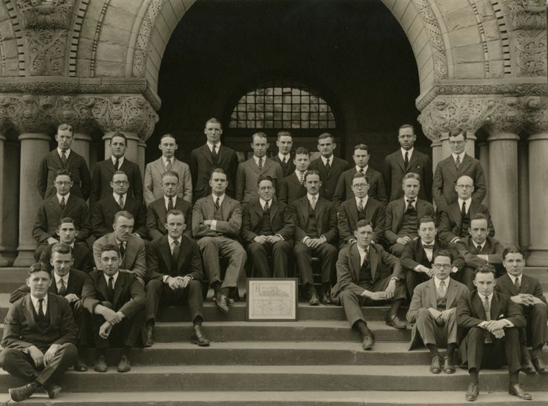 The staff of the Harvard Law Review posing on steps