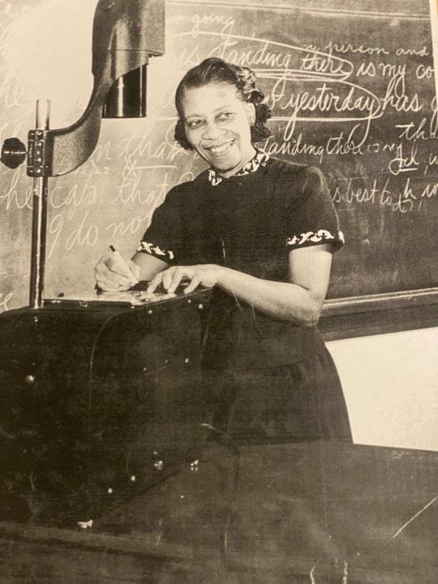 Eva Dykes teaching in a classroom